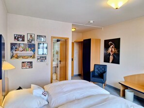 Habitación individual Confort | Ropa de cama de alta calidad y colchones Select Comfort