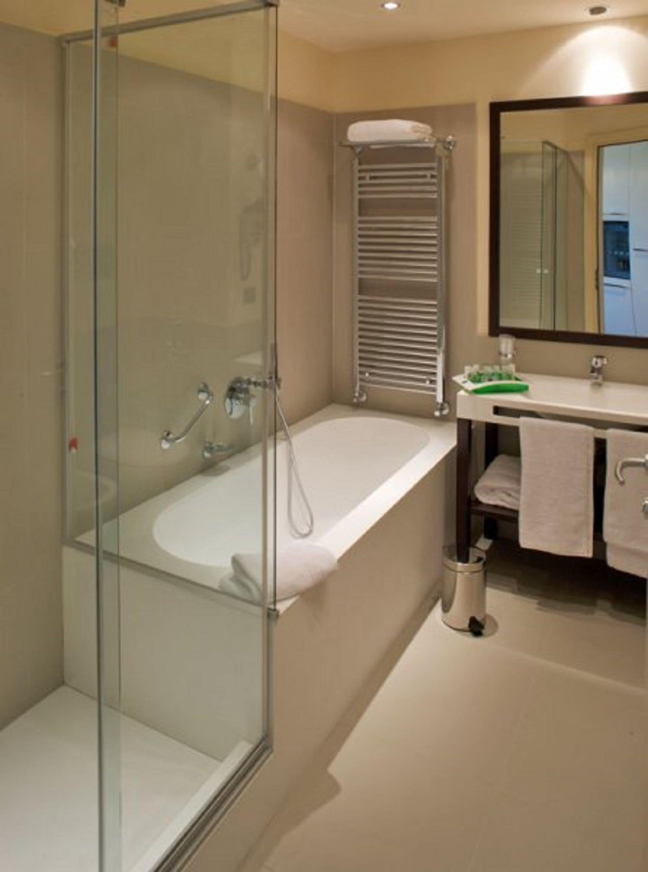 hair dryer, slippers, bidet, towels