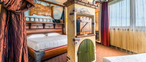 Junior Suite (Family Room - Tema MIRABILANDIA) | Frette Italian sheets, minibar, in-room safe, desk