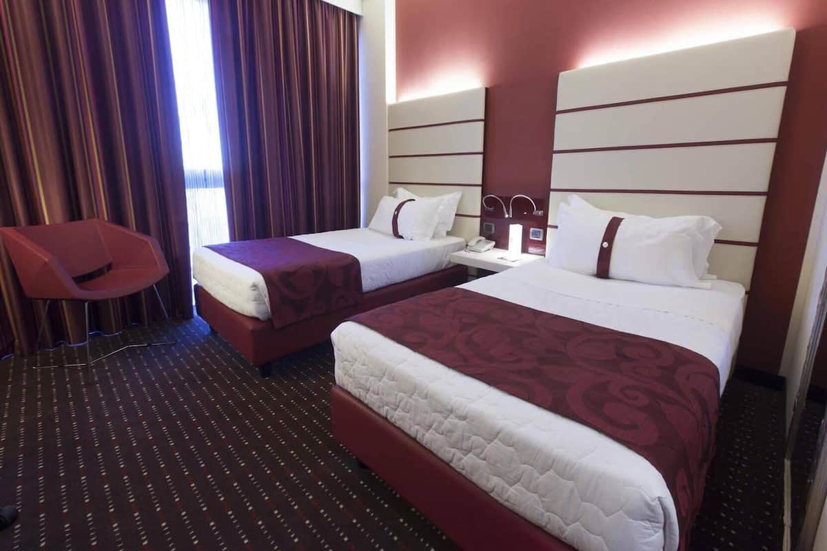 Sábanas italianas Frette, minibar y caja de seguridad en la habitación