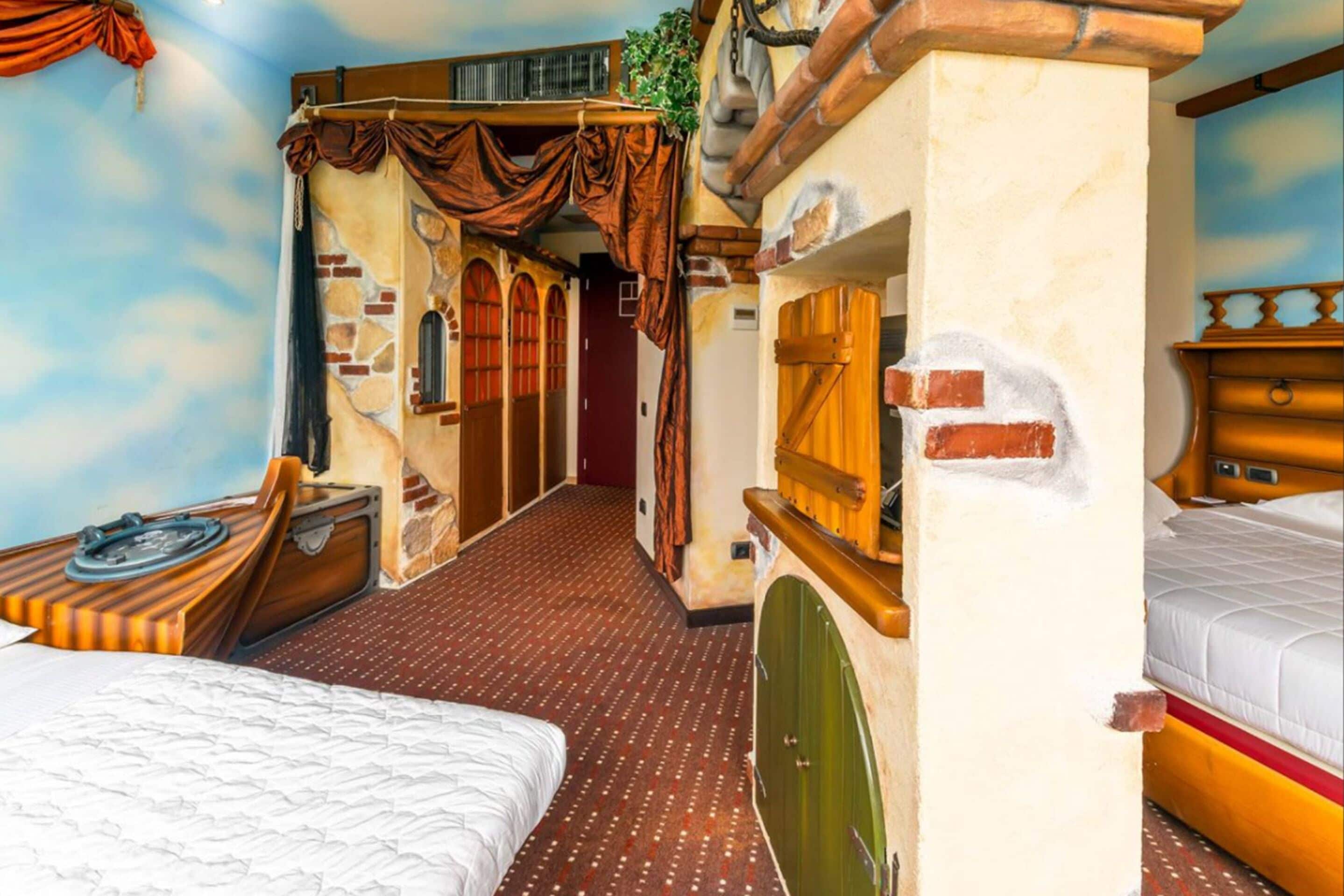 junior suite (family room - tema mirabilandia) | frette italian sheets, minibar, in-room safe, desk