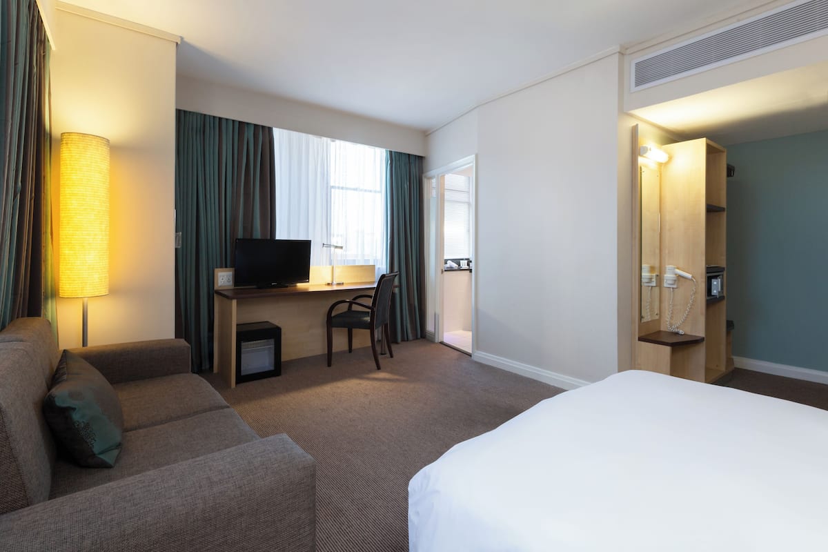 In-room safe, desk, laptop workspace, blackout curtains