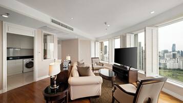 Three-Bedroom Residential Suite | Living area | 40-inch LCD TV with satellite channels, TV