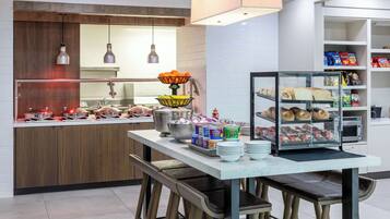 Daily buffet breakfast (USD 12.95 per person)