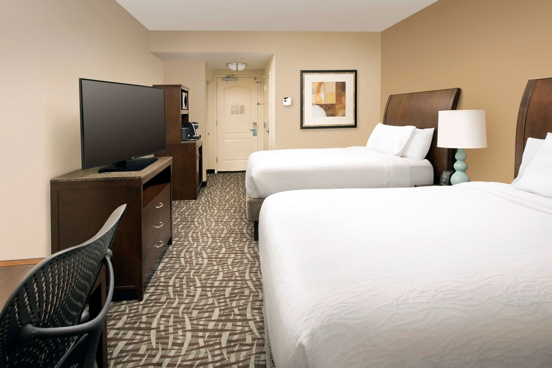 Premium bedding, down comforters, Select Comfort beds, desk