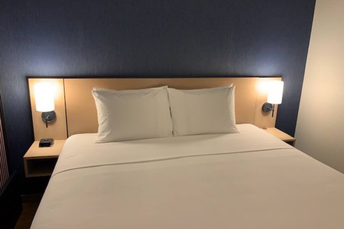 desk, laptop workspace, blackout curtains, iron/ironing board