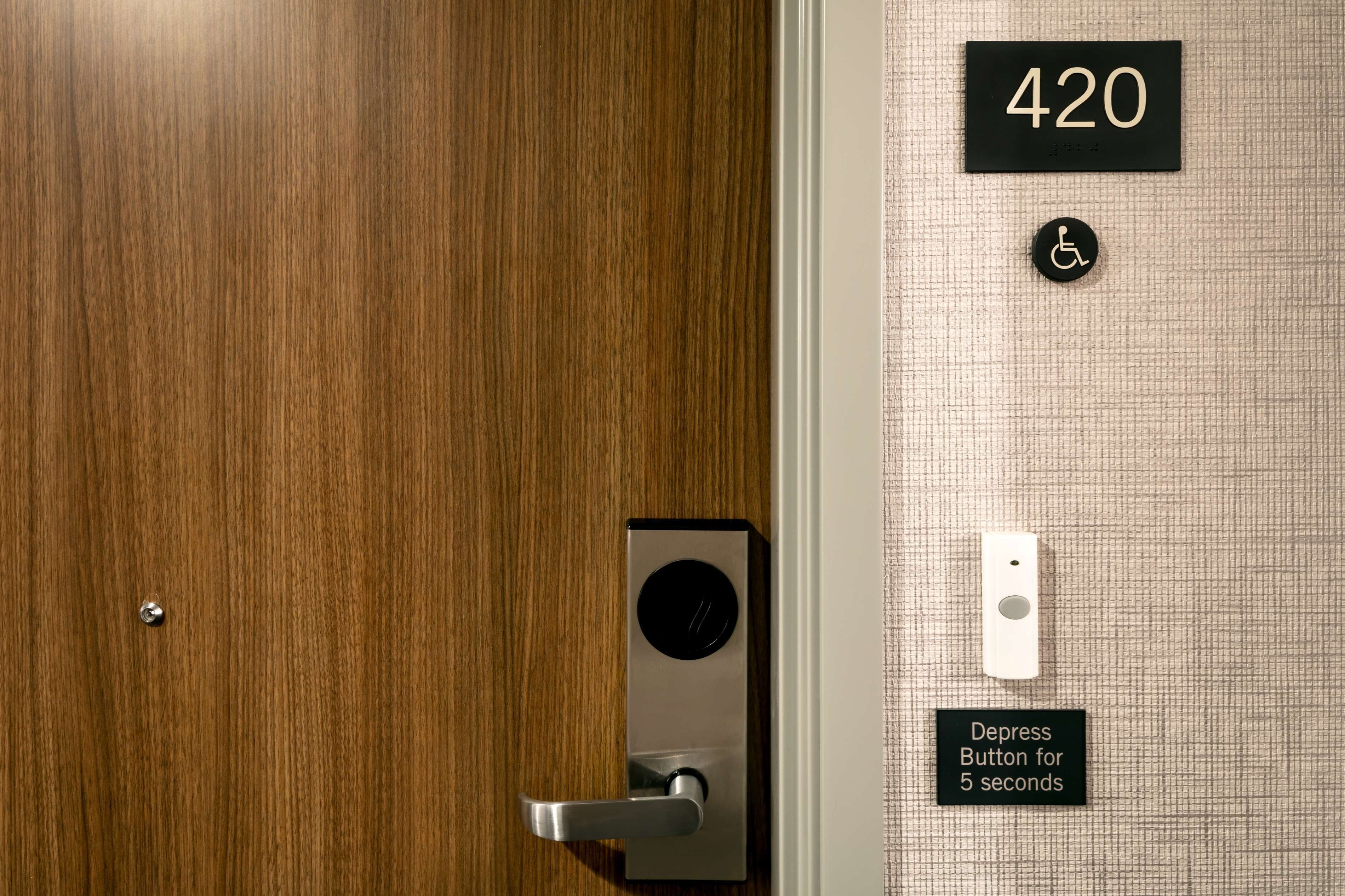 desk, laptop workspace, blackout curtains, iron/ironing board