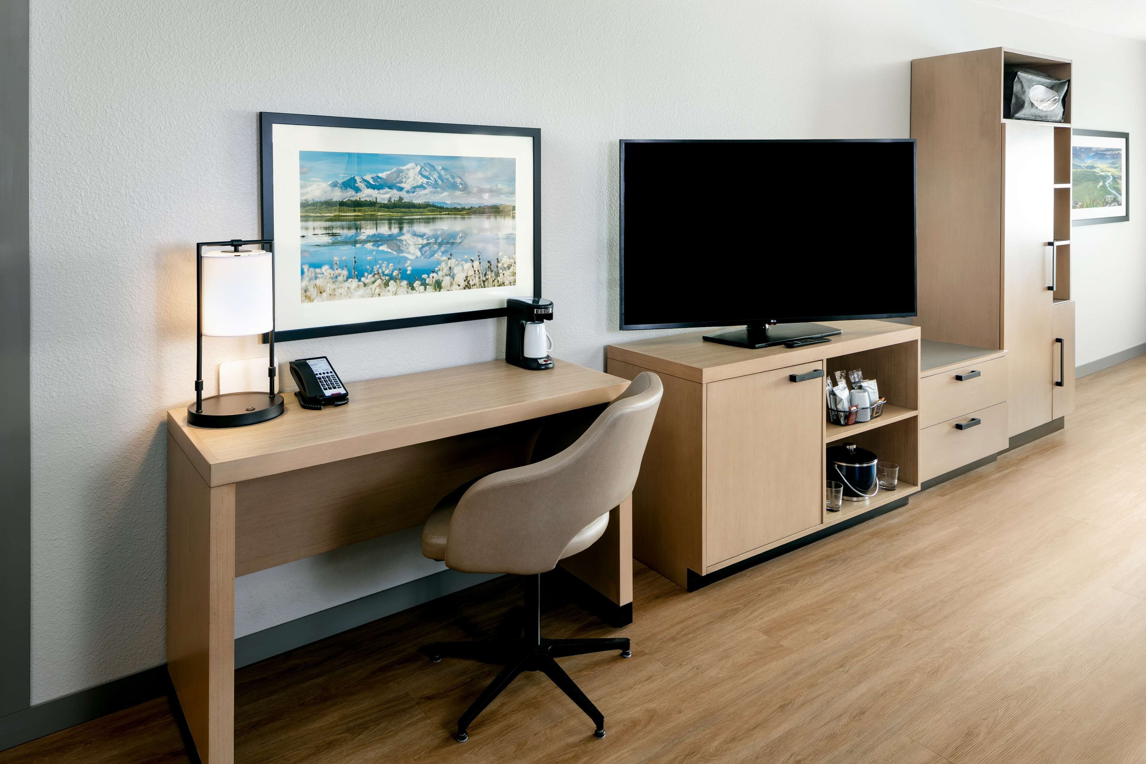 desk, laptop workspace, blackout curtains, iron/ironing board