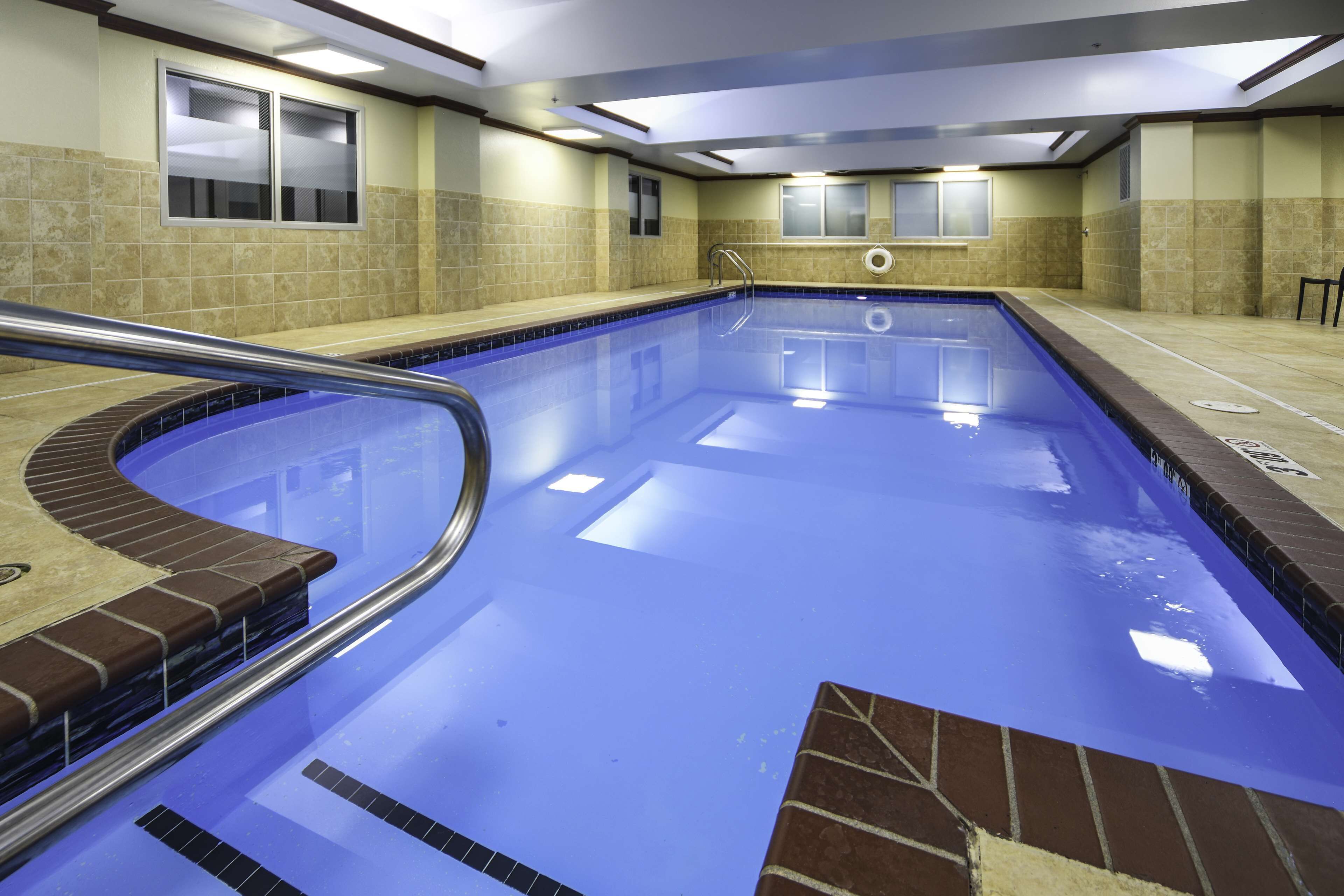 indoor pool, open 10:00 am to 10:00 pm, pool umbrellas, pool loungers