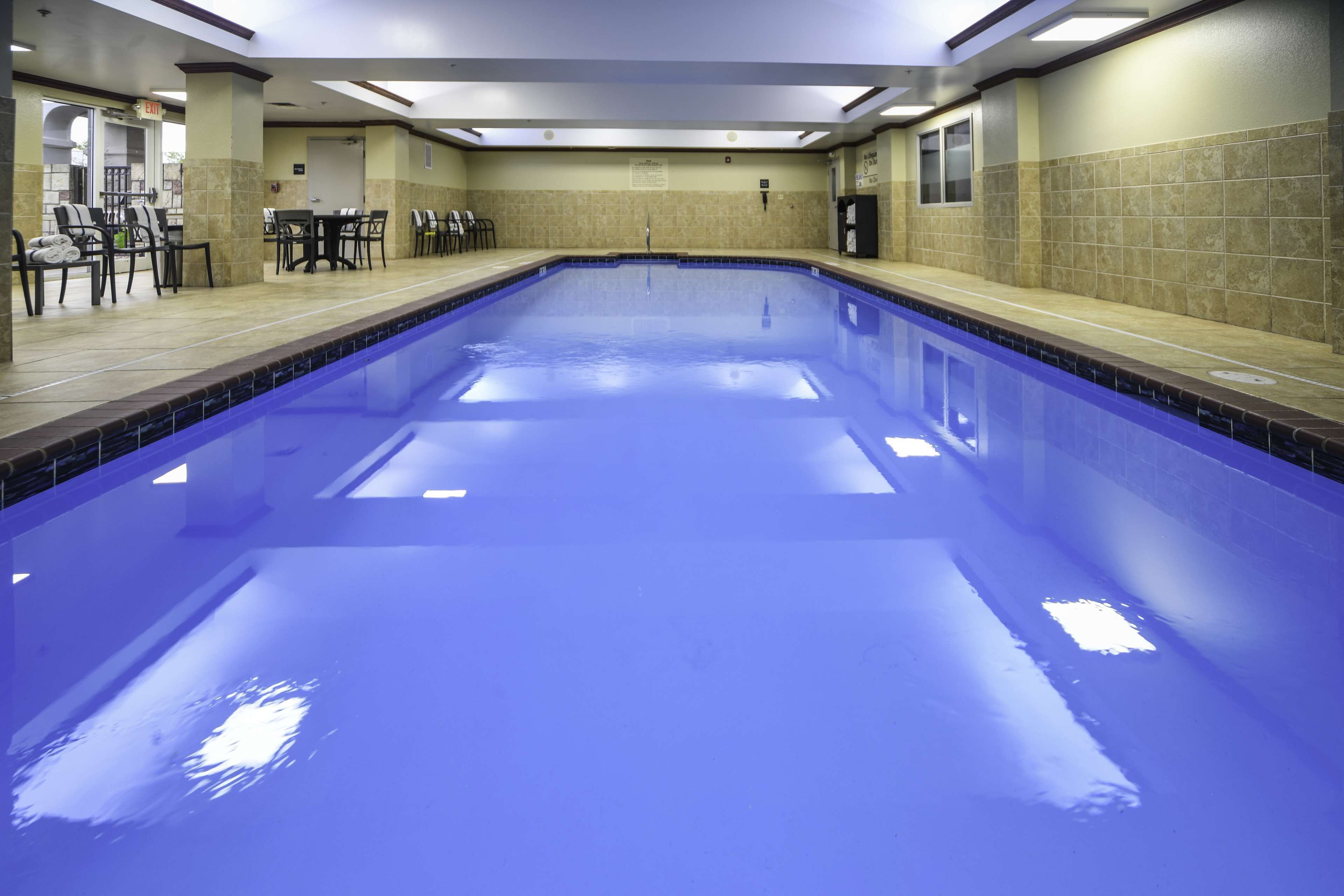 indoor pool, open 10:00 am to 10:00 pm, pool umbrellas, pool loungers