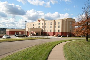 Hotel features a modern design with a flat roof and symmetrical facade.