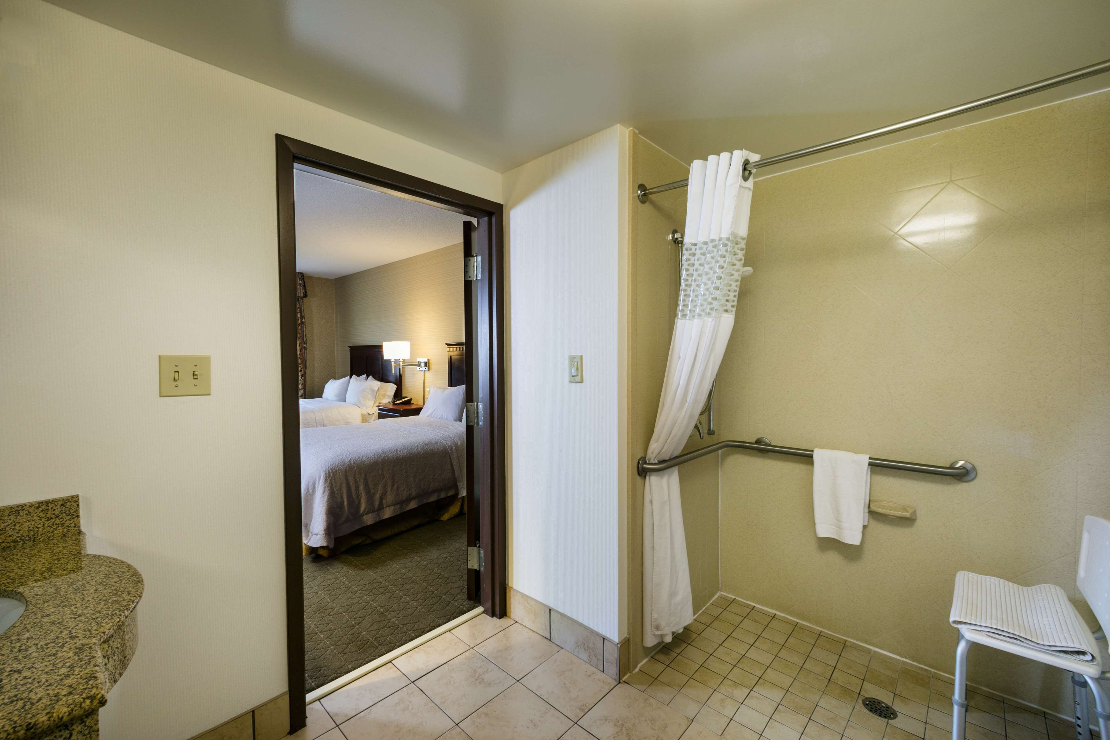 suite, 2 queen beds, accessible, non smoking | bathroom | shower, hair dryer, towels