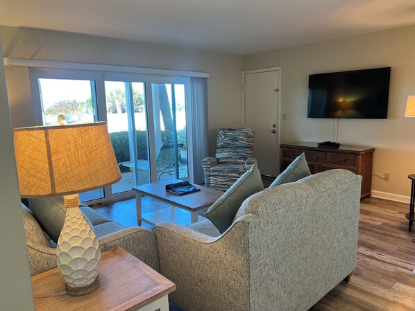 Two Bedroom (CAM-2) | Living area | Flat-screen TV, DVD player