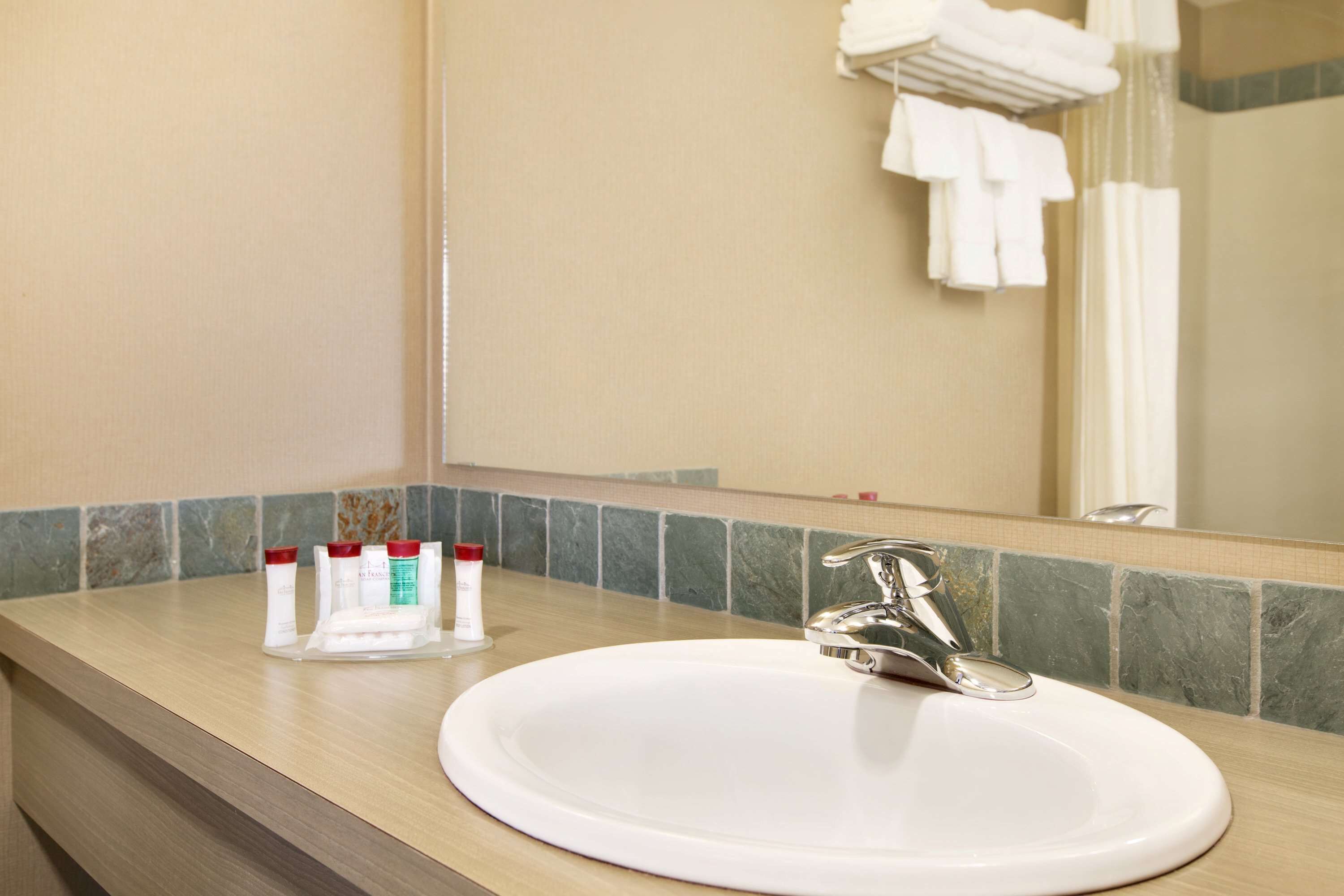 combined shower/bathtub, free toiletries, hair dryer, towels