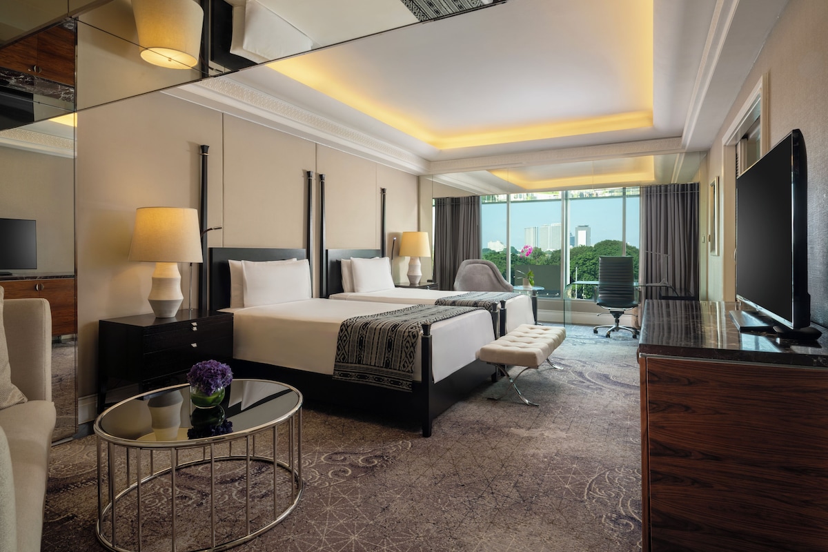 Premium bedding, pillow-top beds, free minibar, in-room safe