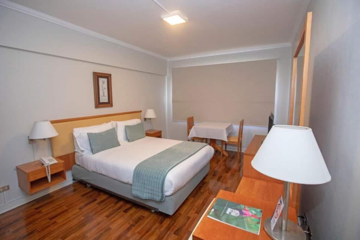 Premium bedding, pillow-top beds, minibar, in-room safe