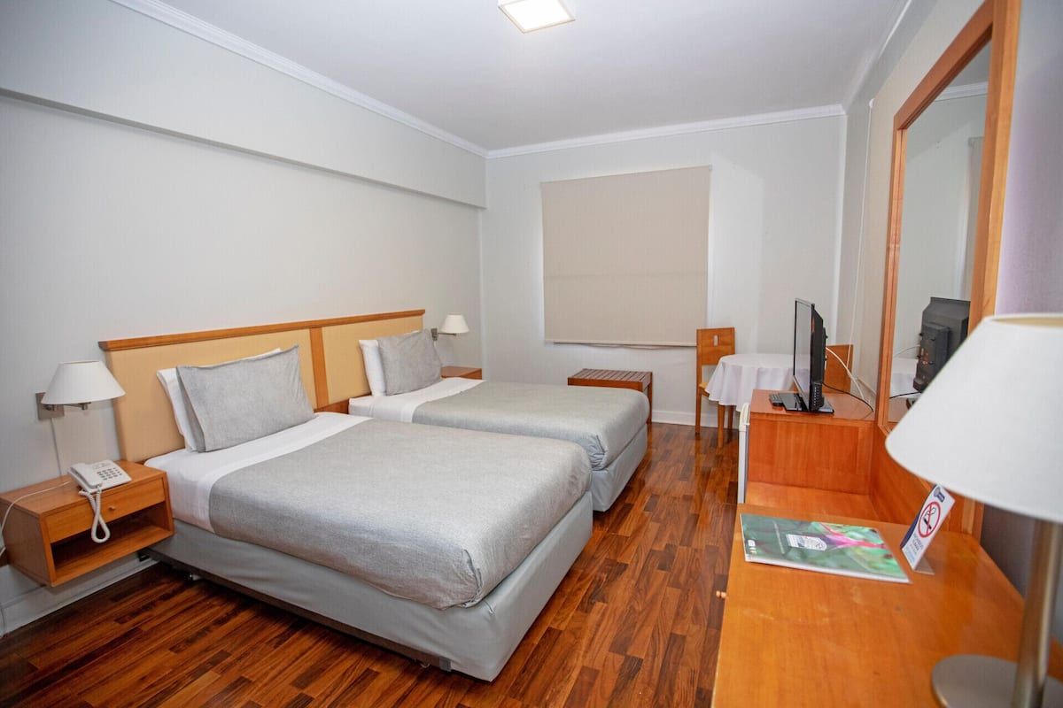 Premium bedding, pillow-top beds, minibar, in-room safe