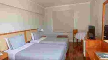 Premium bedding, pillow-top beds, minibar, in-room safe