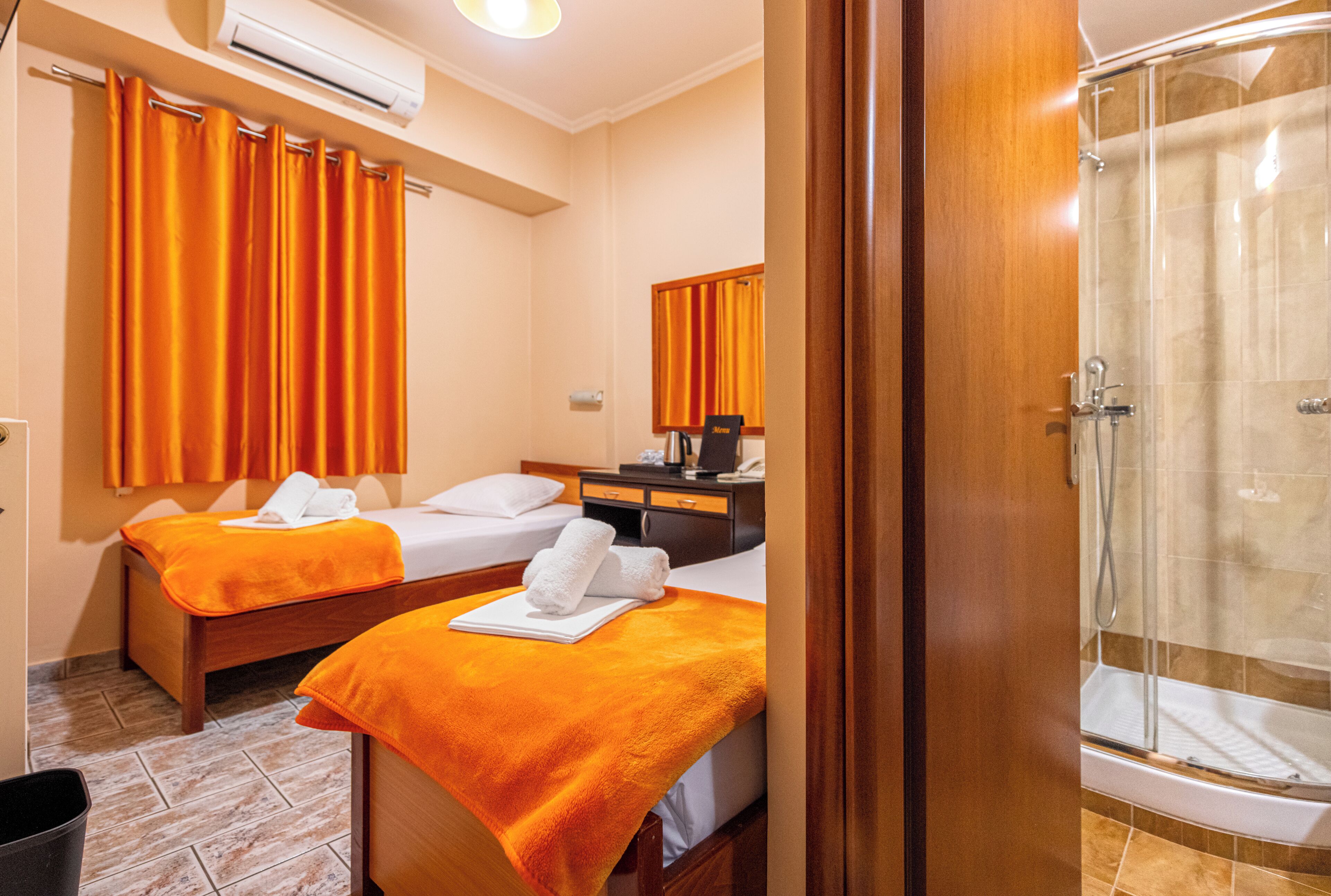 double or twin room | minibar, desk, blackout curtains, iron/ironing board