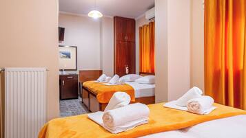 Minibar, desk, blackout curtains, iron/ironing board