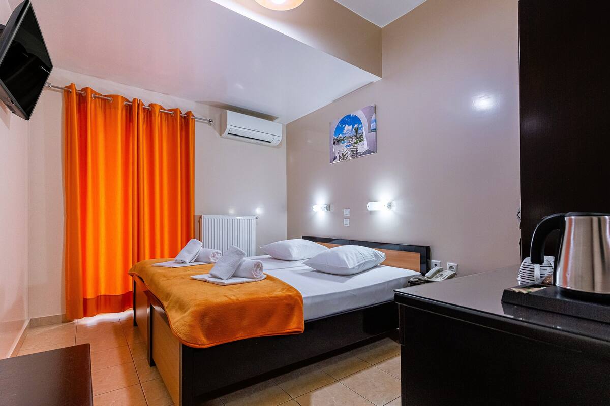 double or twin room | minibar, desk, blackout curtains, iron/ironing board