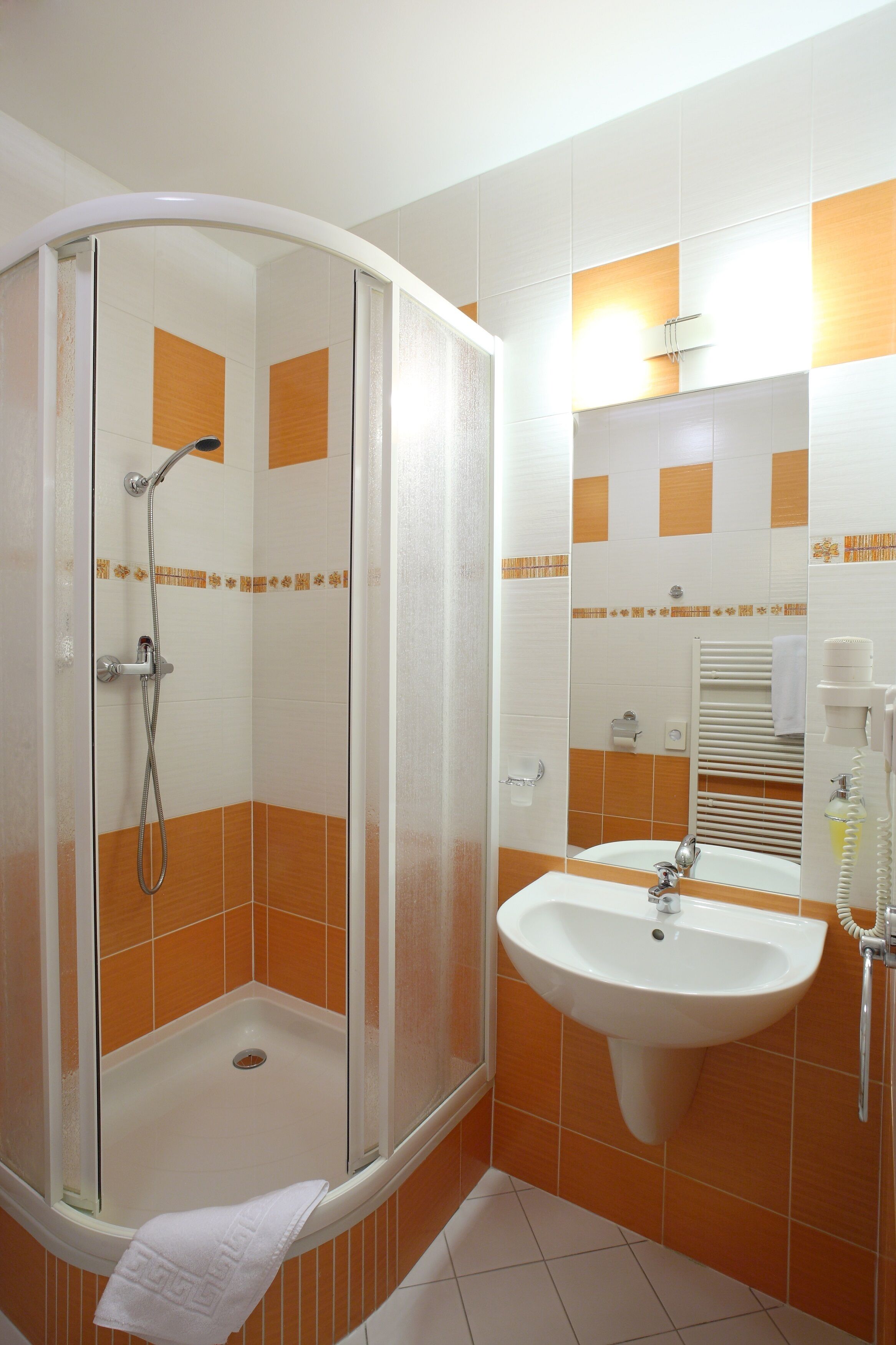 superior twin room | bathroom | hair dryer, towels