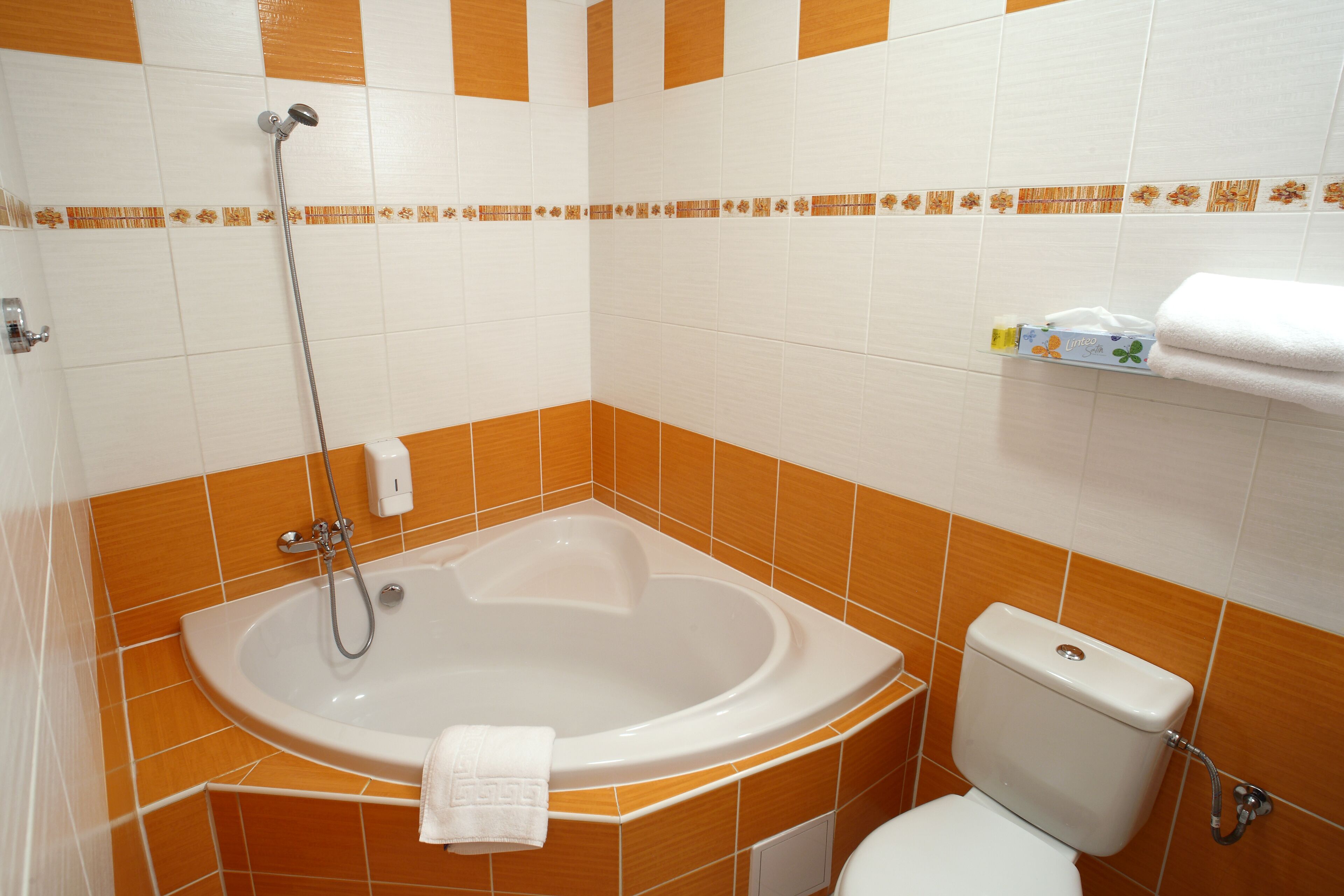 superior double room | bathroom | hair dryer, towels