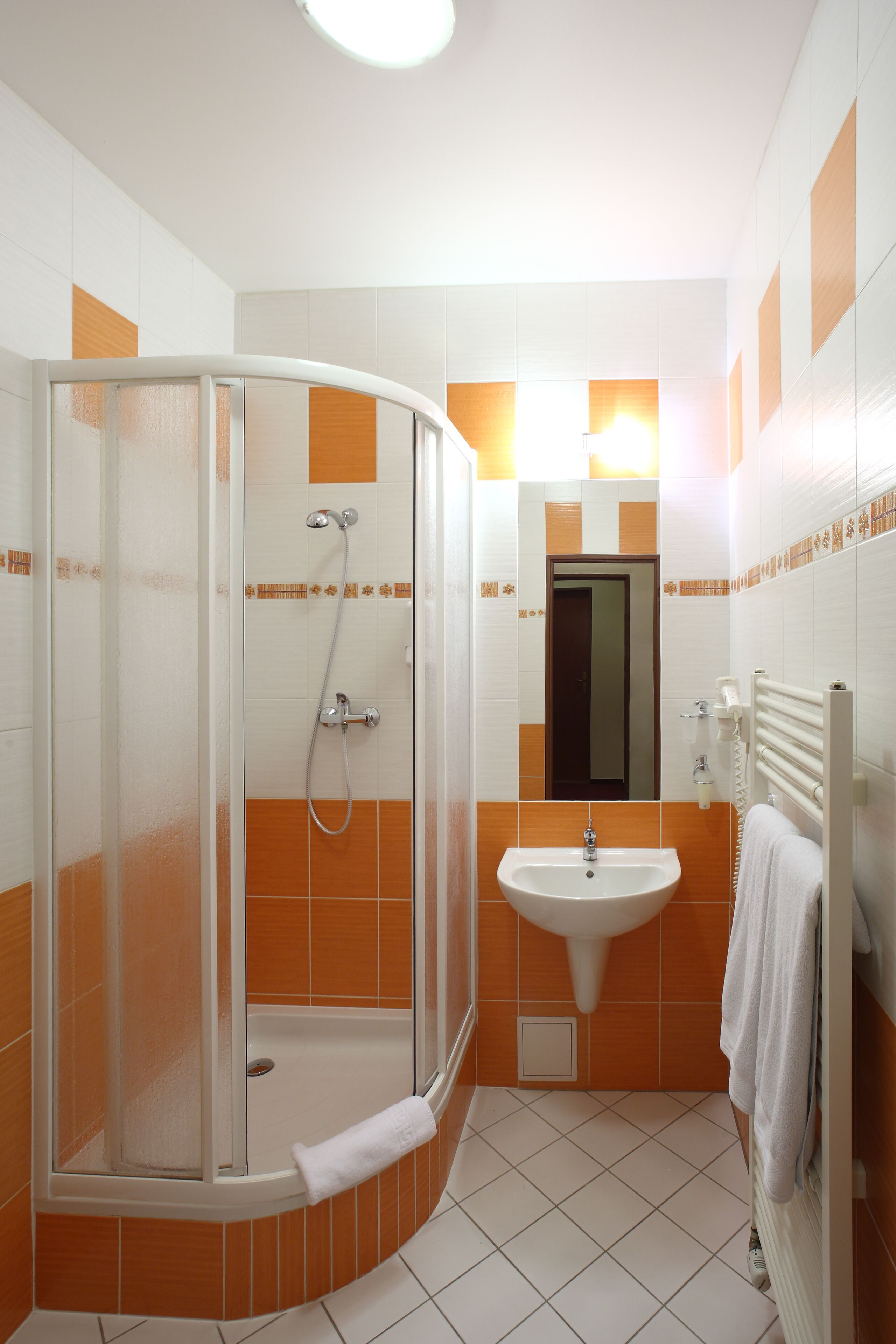 superior single room | bathroom | hair dryer, towels
