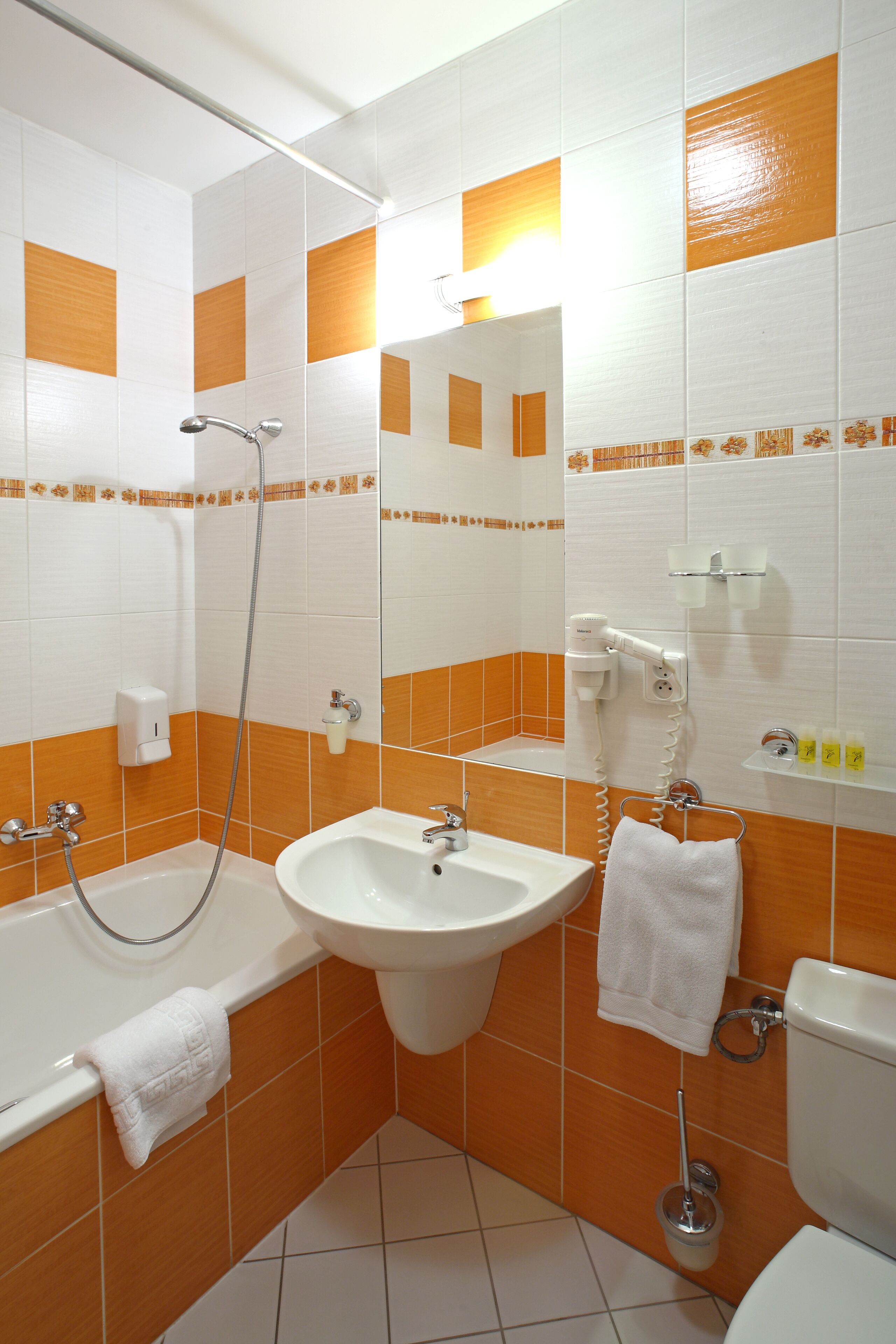superior twin room | bathroom | hair dryer, towels