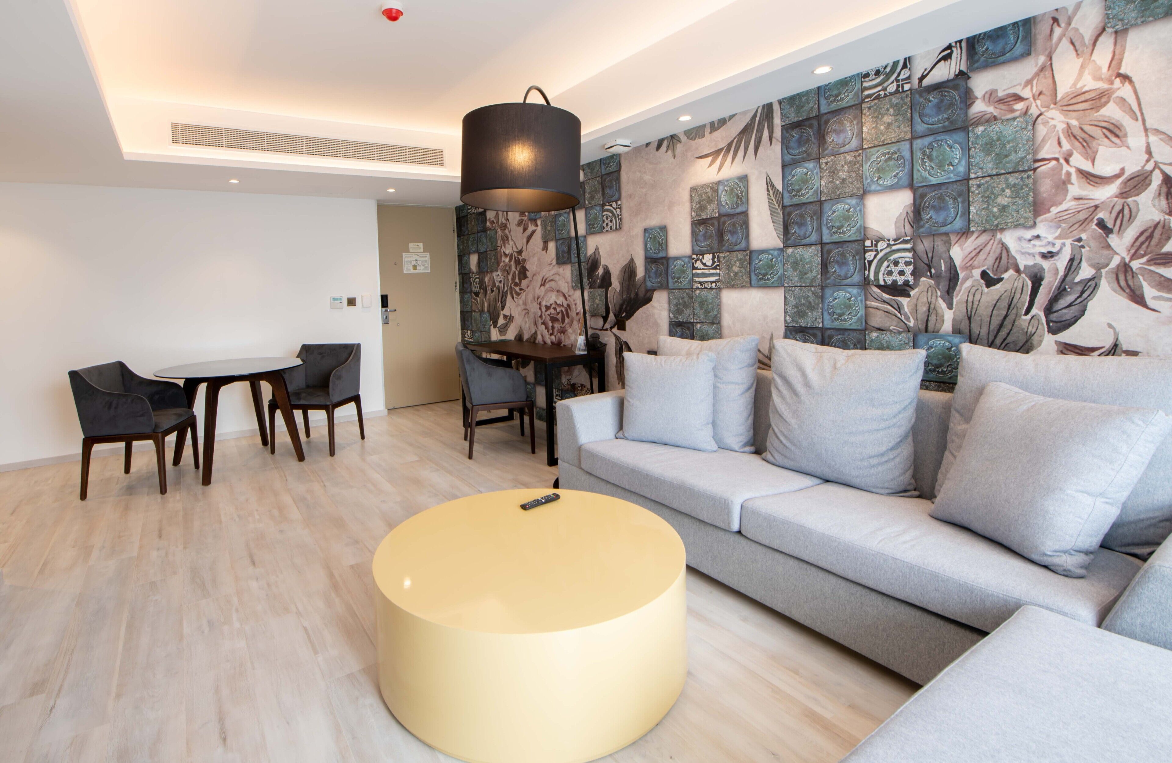 deluxe suite, 1 king bed | living area | 43-inch tv with satellite channels, netflix