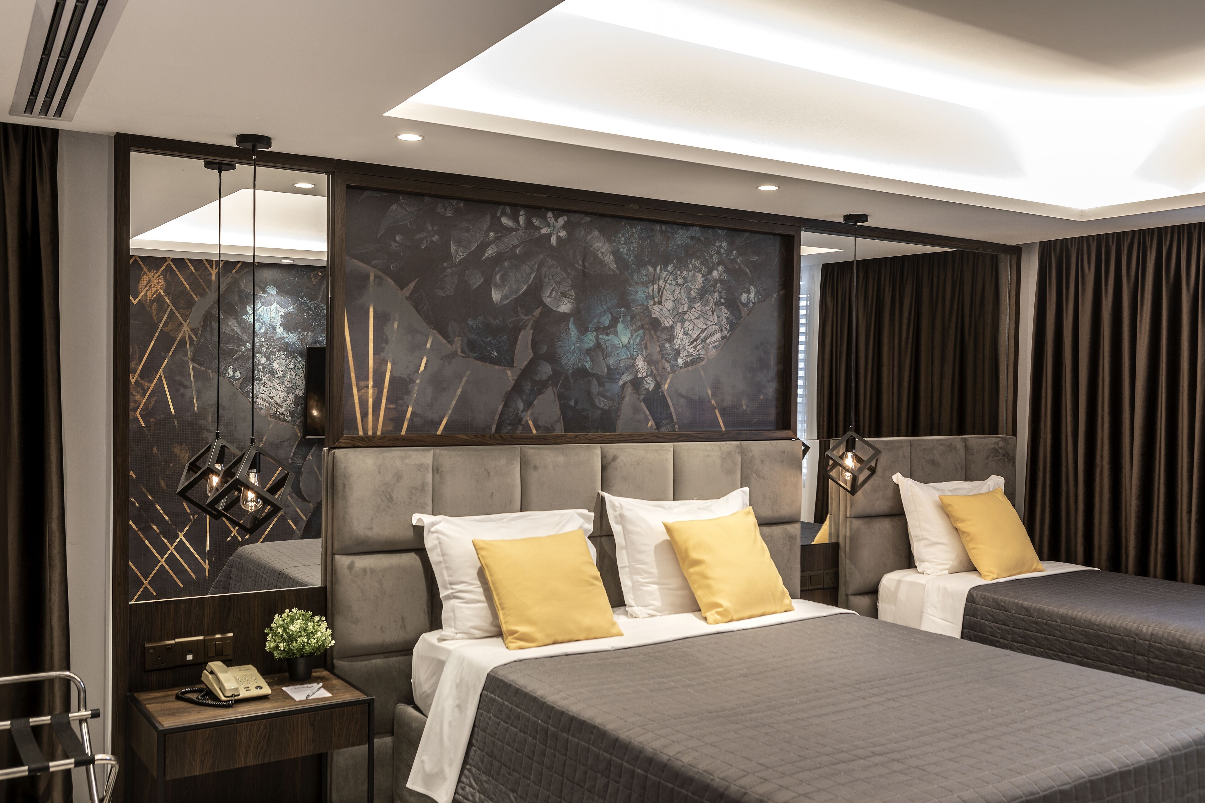 executive suite (triple) | 1 bedroom, memory-foam beds, in-room safe, individually decorated