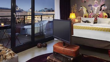 Premium bedding, down comforters, minibar, in-room safe