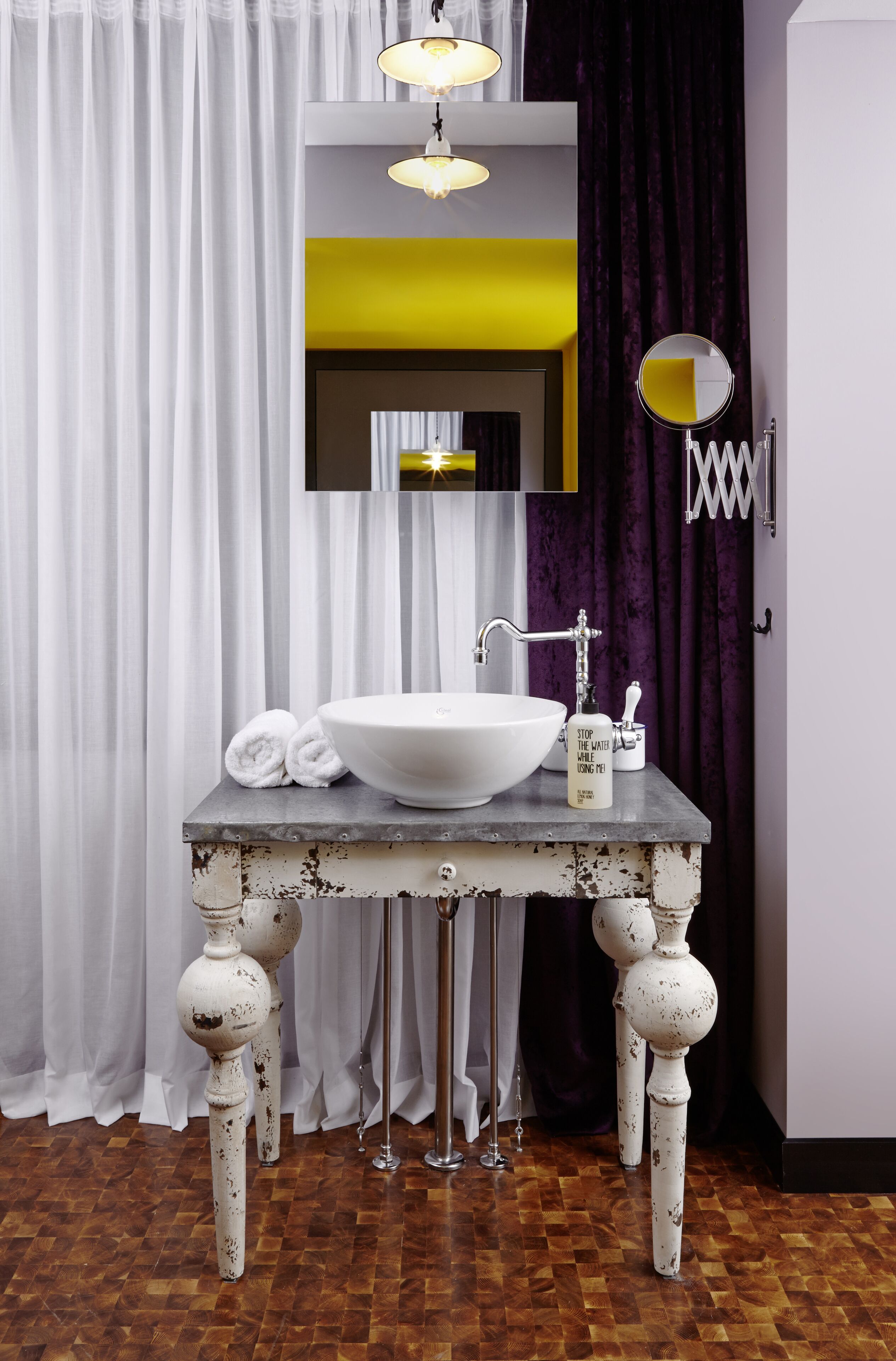 designer toiletries, hair dryer, towels, soap