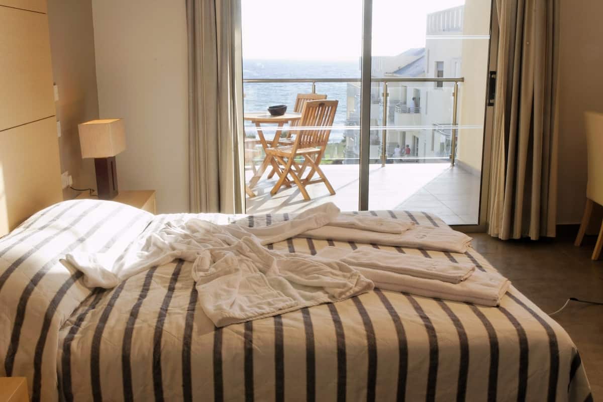 In-room safe, blackout drapes, iron/ironing board, bed sheets