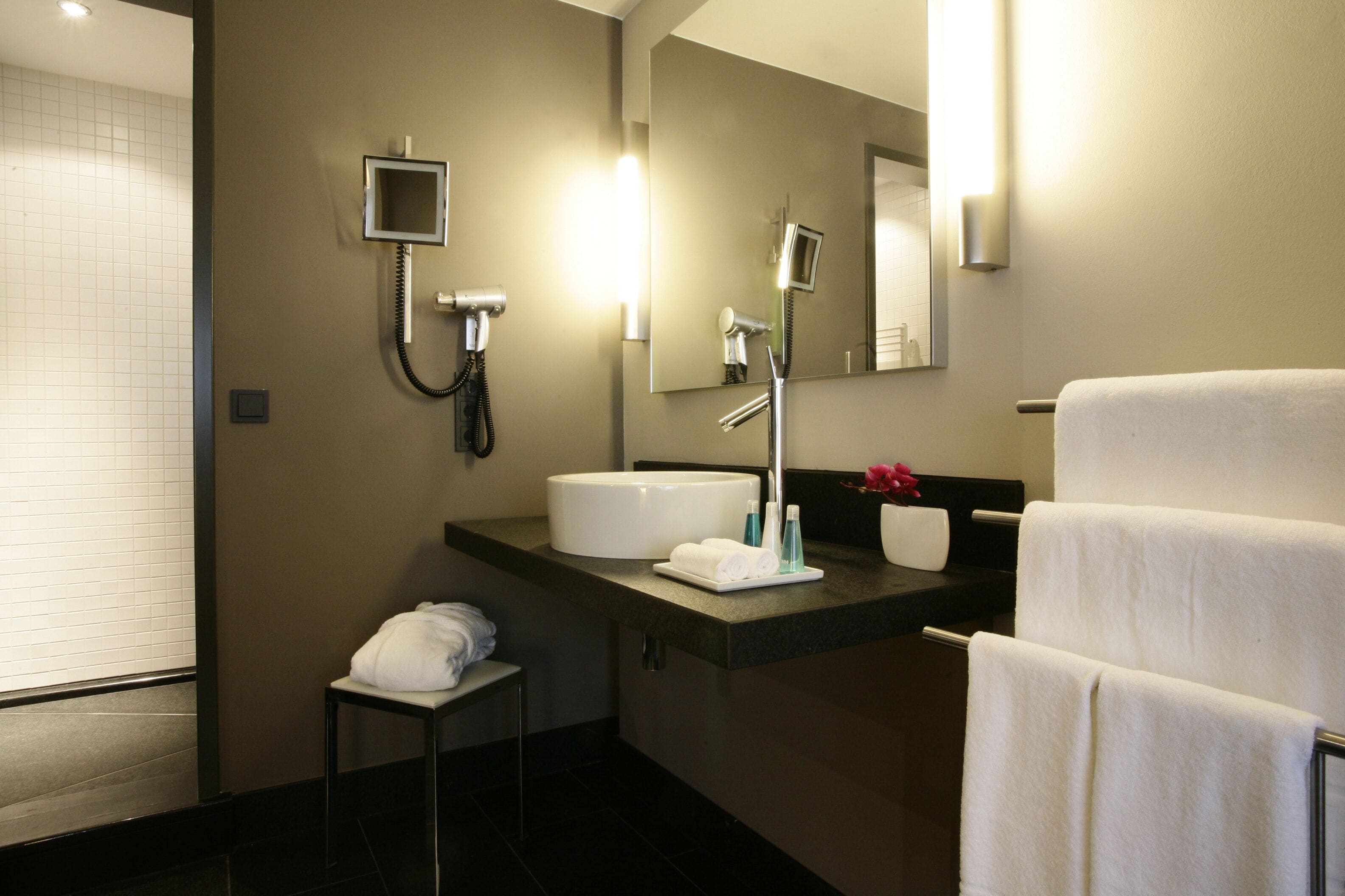 large design | bathroom | eco-friendly toiletries, hair dryer, bathrobes, slippers