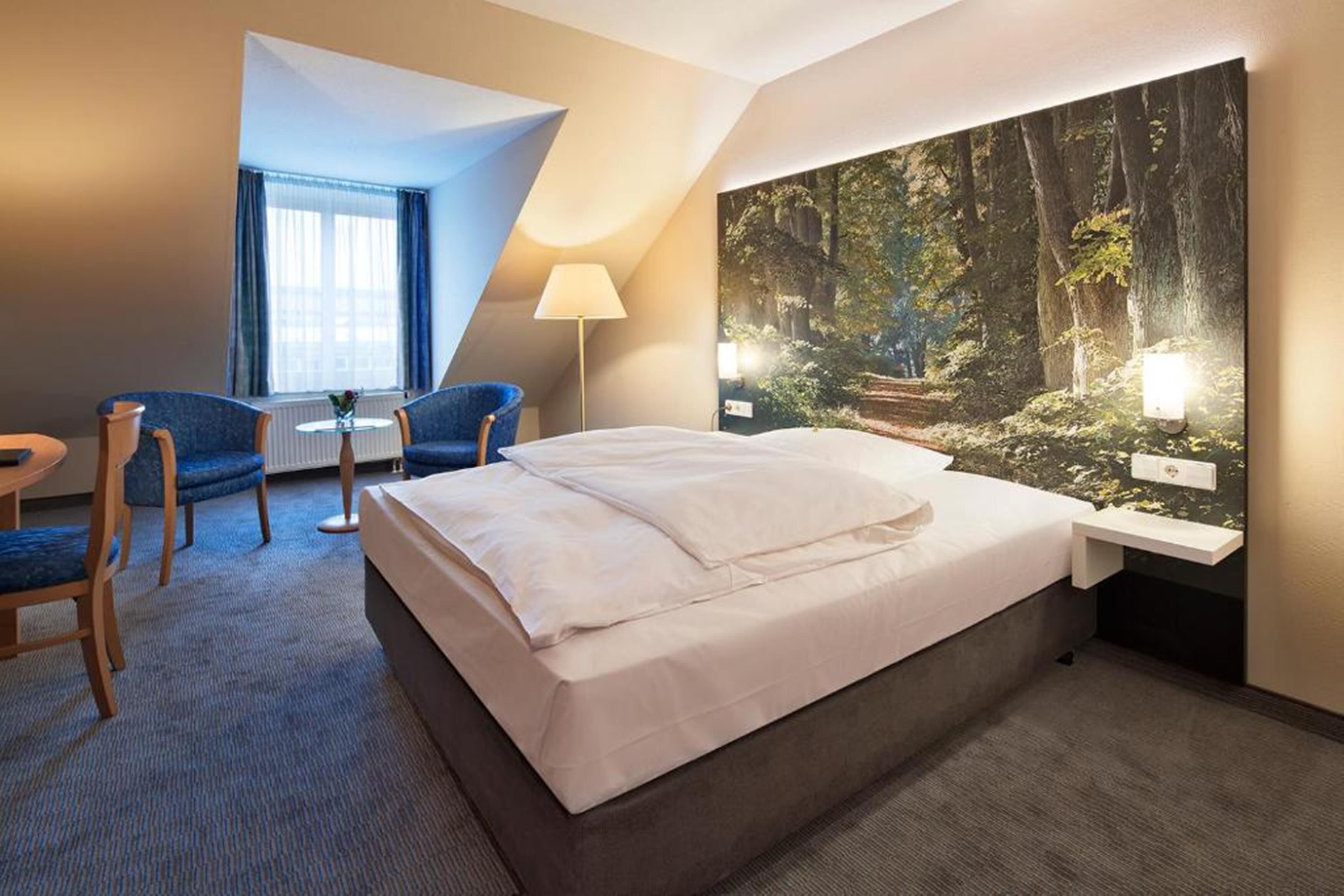 hypo-allergenic bedding, in-room safe, desk, blackout curtains