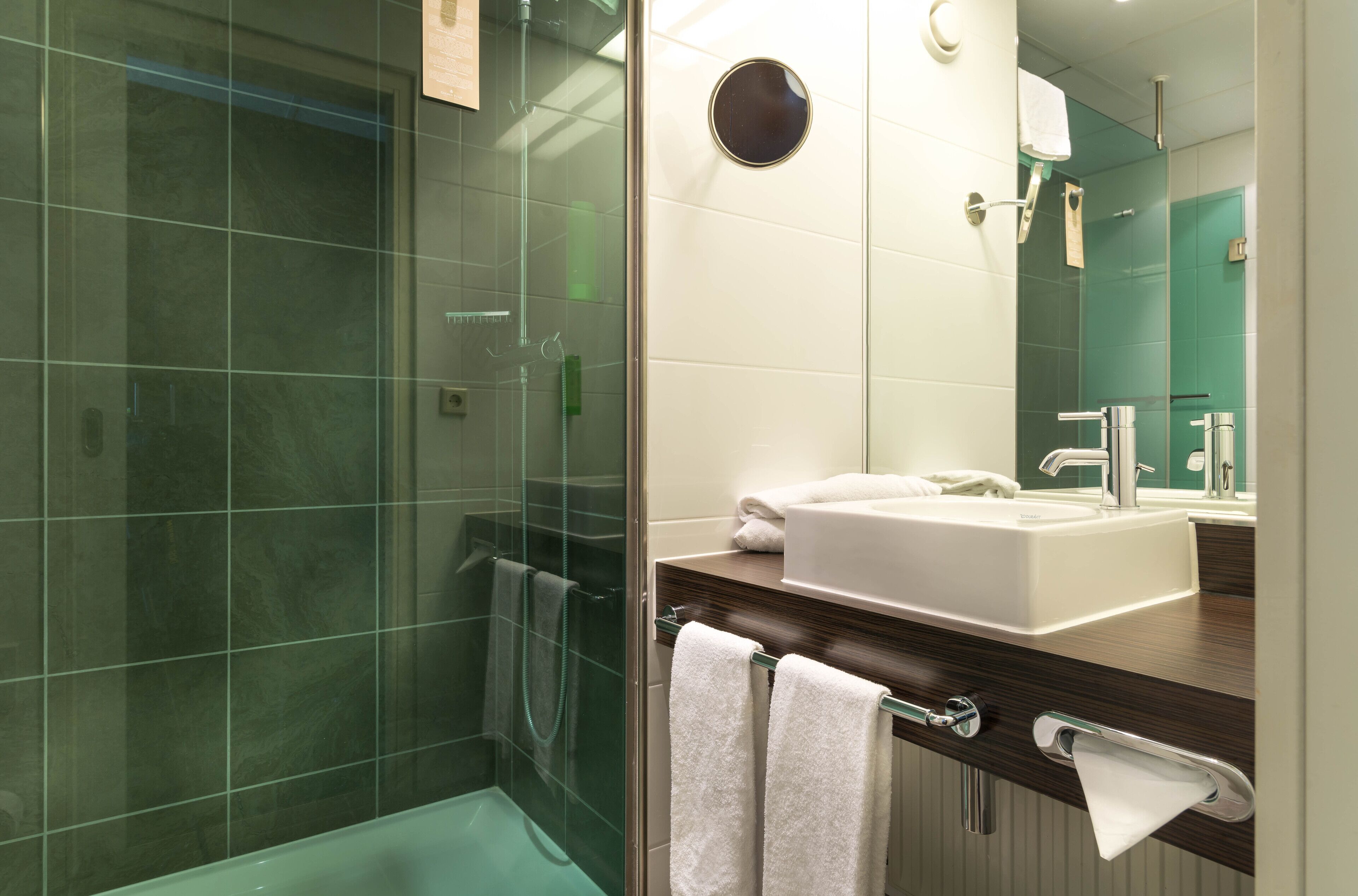 junior suite, 2 single beds | bathroom | eco-friendly toiletries, hair dryer, towels, soap