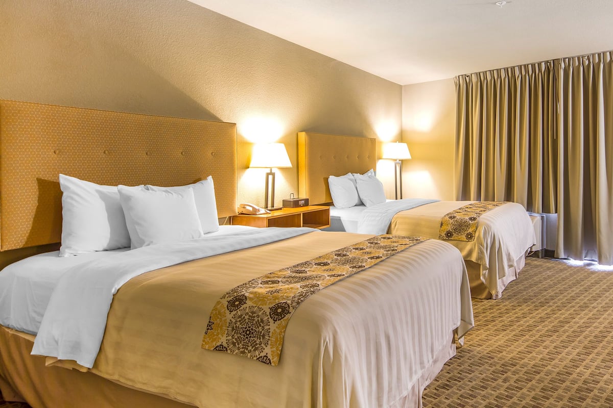 premium bedding, pillow-top beds, desk, blackout curtains