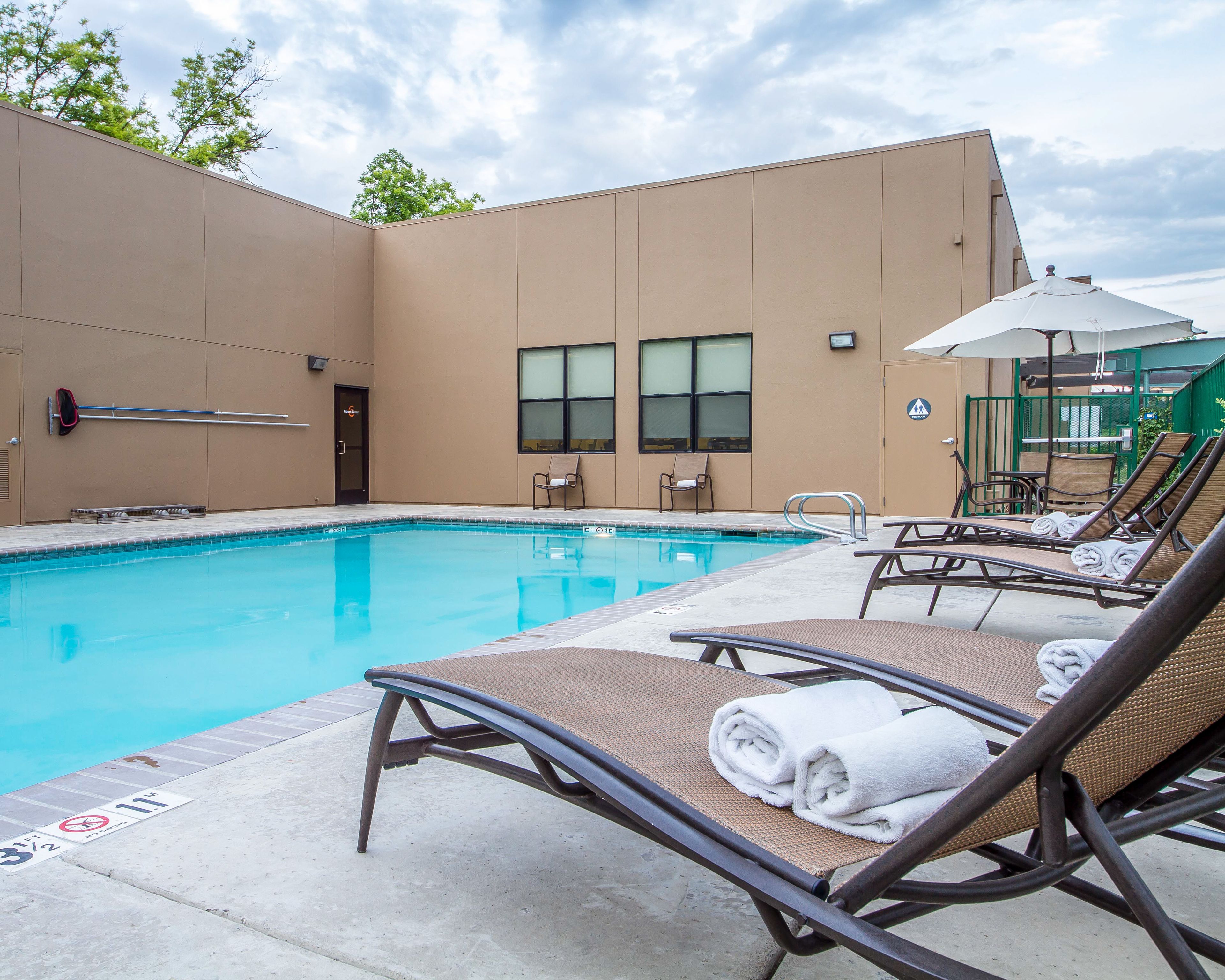 outdoor pool, pool umbrellas, pool loungers