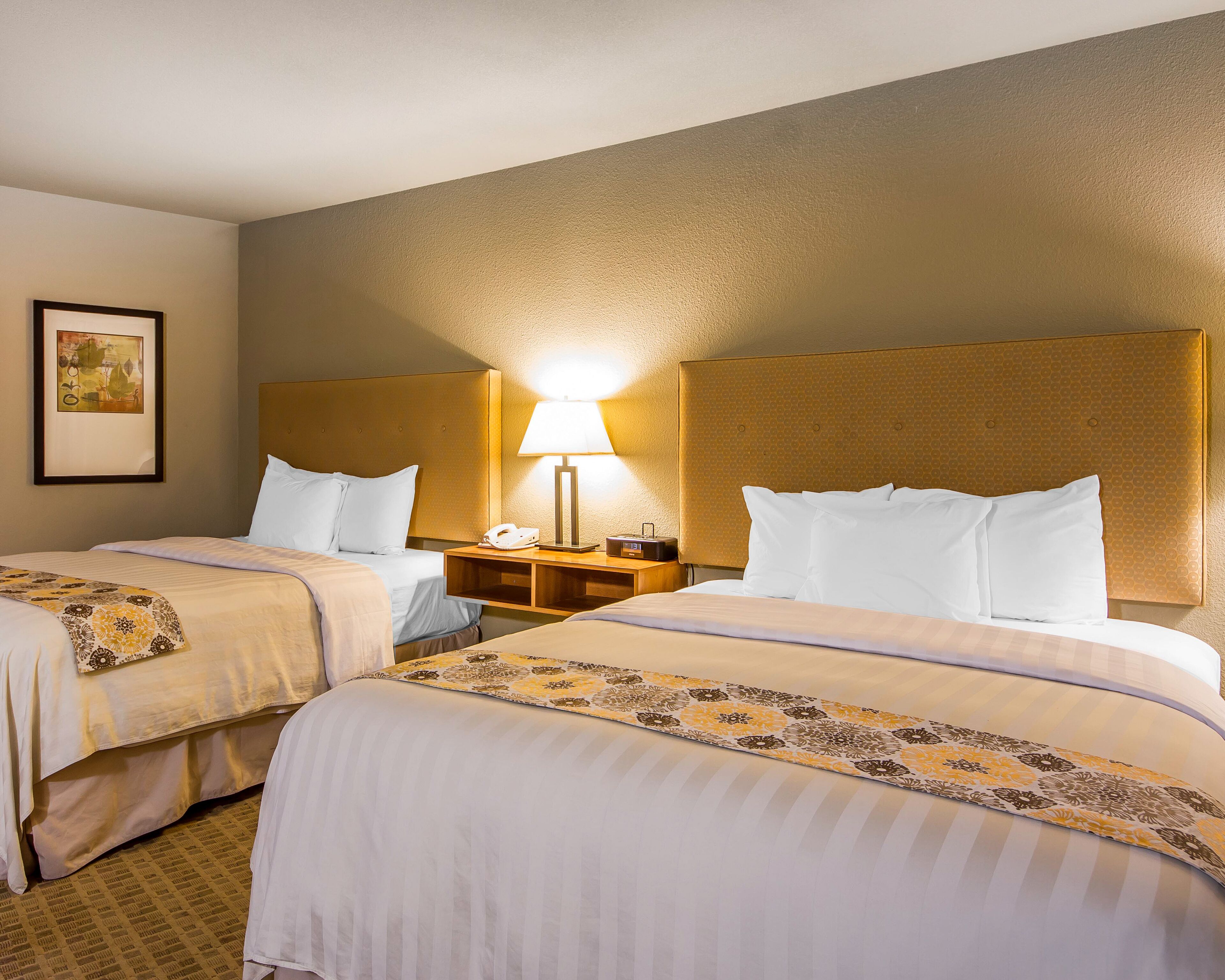 premium bedding, pillow-top beds, desk, blackout curtains