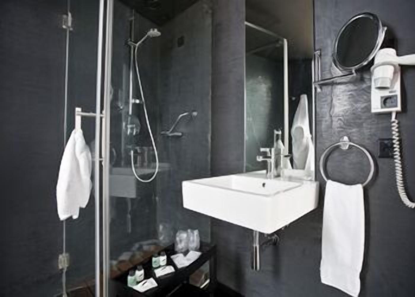 standard room | bathroom | shower, hair dryer, slippers, towels