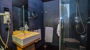 Shower, hair dryer, slippers, towels