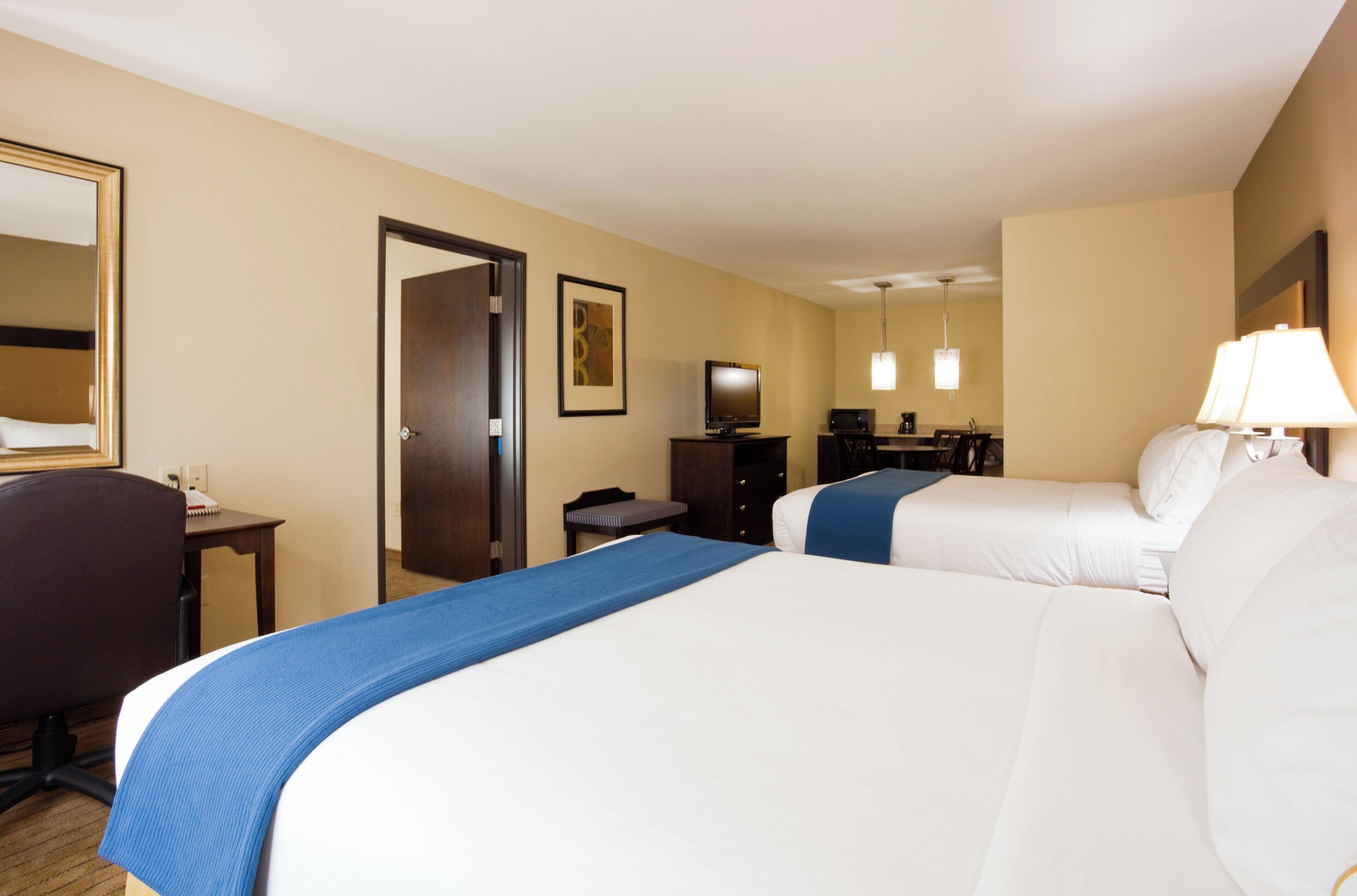 Premium bedding, down comforters, pillowtop beds, in-room safe