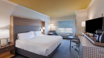 Desk, laptop workspace, iron/ironing board, free cribs/infant beds