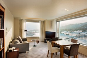 Suite Room | Living area | 32-inch LCD TV with cable channels, TV - Hilton Niseko Village (Niseko)