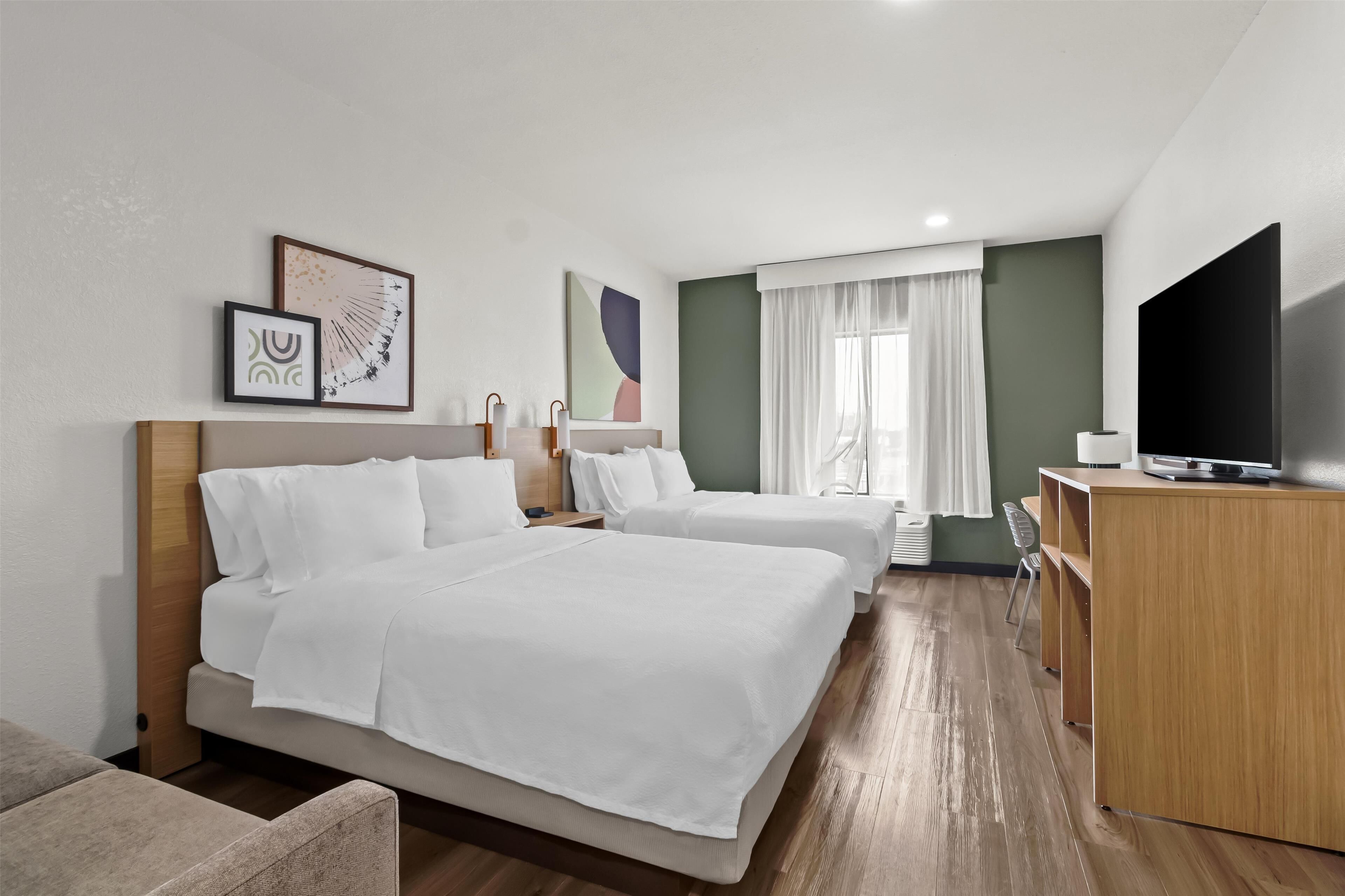 room, 2 queen beds | desk, laptop workspace, iron/ironing board, free wifi