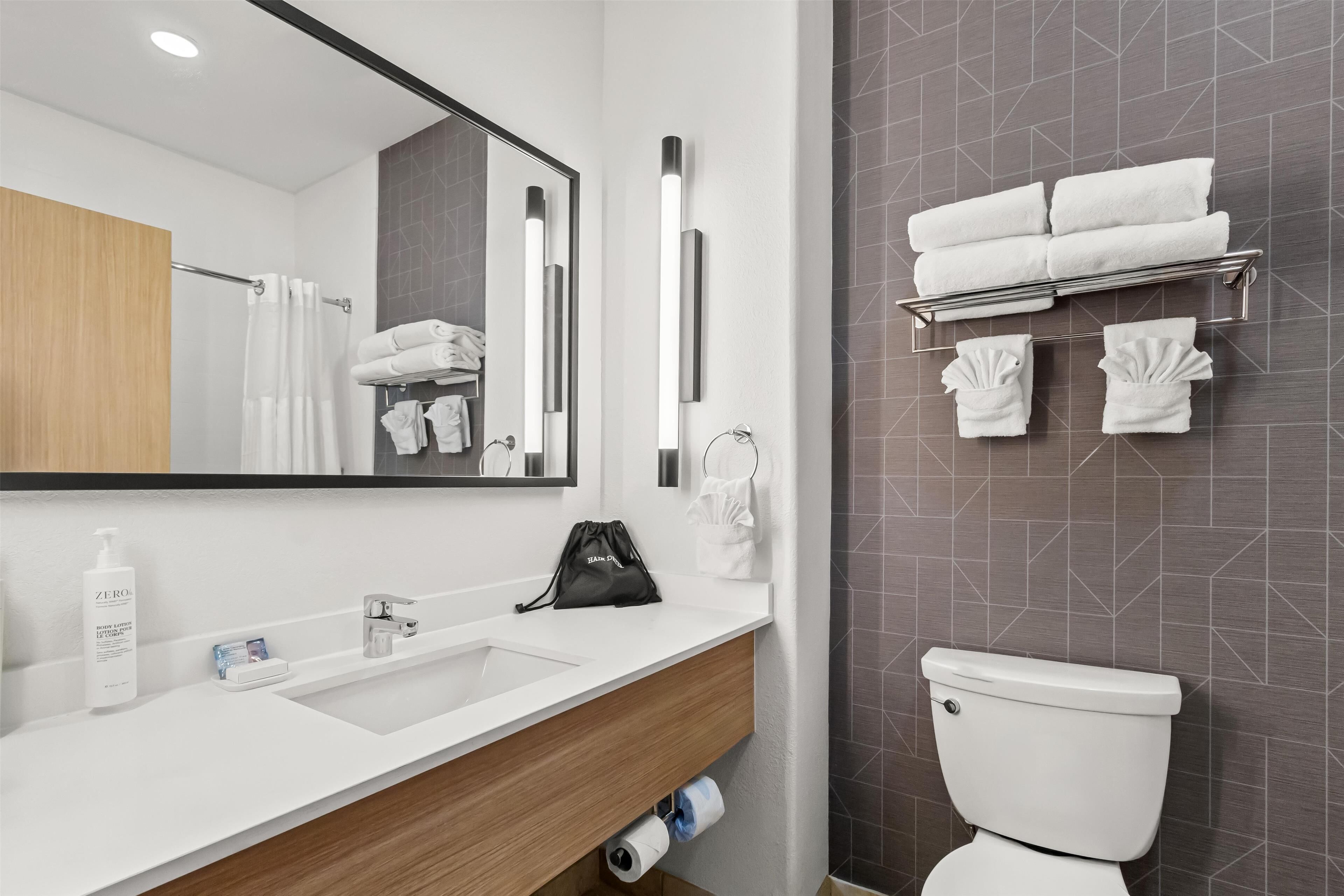 room, 2 queen beds | bathroom | combined shower/bathtub, free toiletries, hair dryer, towels