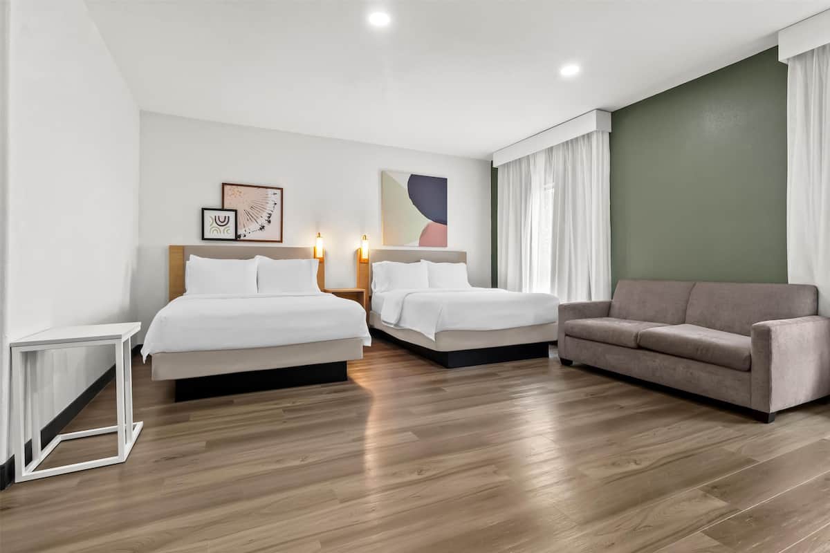 Room, 2 Queen Beds, Accessible (Mobility & Hearing, Roll-in Shower) | Living area | Flat-screen TV