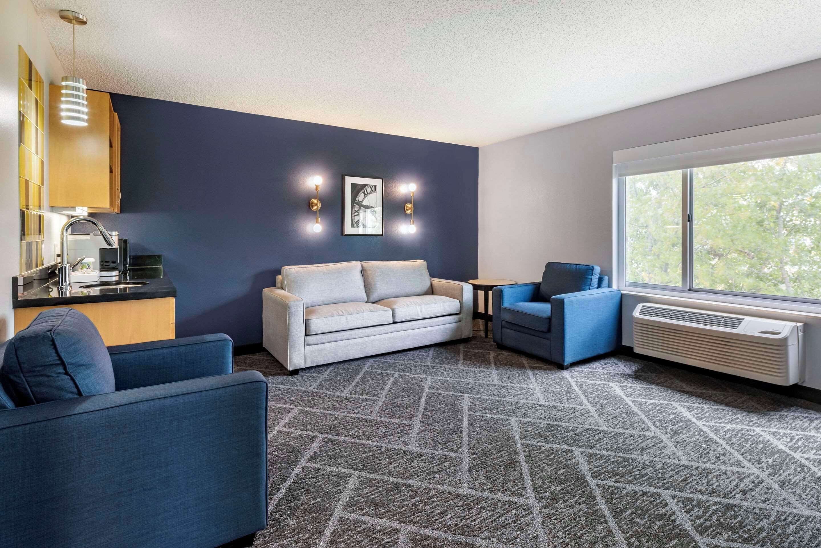 premium bedding, desk, laptop workspace, blackout curtains