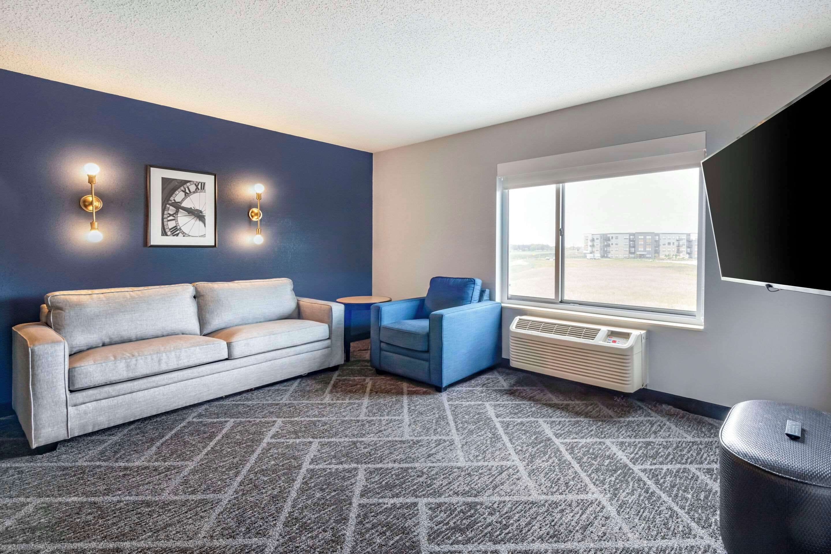 premium bedding, desk, laptop workspace, blackout curtains